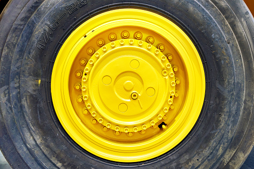Wheel and tire of large industrial mining machine