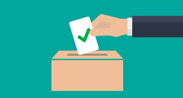 A man's hand placing a ballot with a check mark in the ballot box. Politics and election. Vector. A man's hand placing a ballot with a check mark in the ballot box. Politics and election. Editable vector. suggestion box stock illustrations