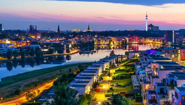 Scenic summer evening panorama of architecture around Phoenix See in Dortmund, Germany