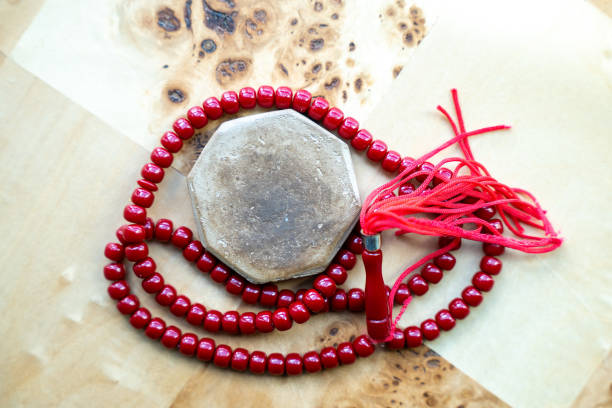 istock Macro Photograph with Rosary Beads and Turbah 1407155990