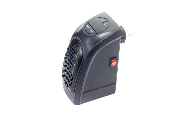 istock The small wall-outlet heater close-up 1407160099