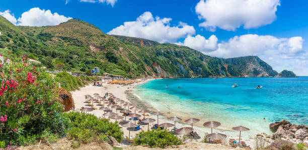 Landscape with Petani beach on Kefalonia, Greece Landscape with Petani beach on Kefalonia, Ionian island, Greece paralia stock pictures, royalty-free photos & images