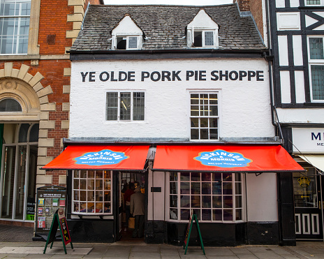Melton Mowbray, UK - June 11th 2022: Ye Olde Pork Pie Shoppe in Melton Mowbray, Leicestershire, UK. The town is famous for producing the Melton Mowbray Pork Pie.