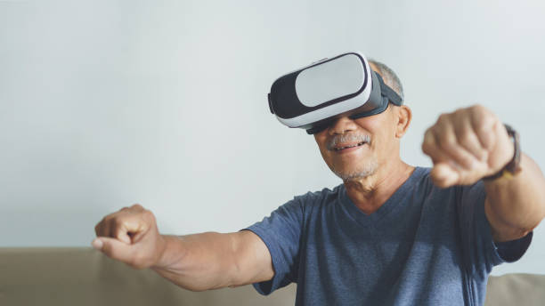 istock Asian Senior with virtual reality game 1407164494