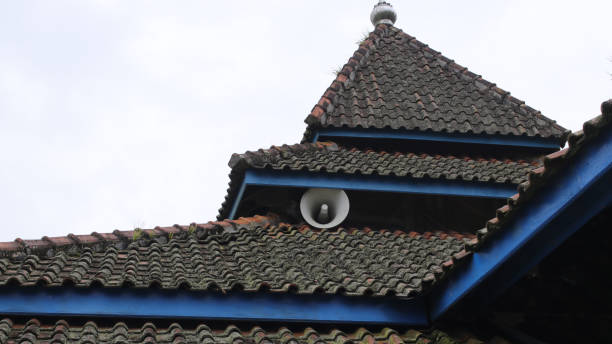 istock Old white speaker in the corner of an old mosque 1407164674