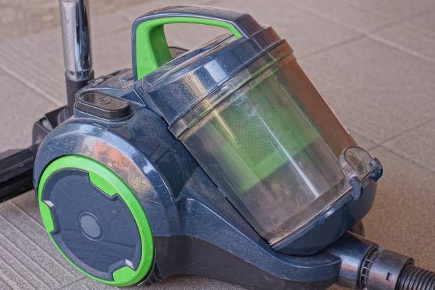 istock one big blue green plastic vacuum cleaner 1407167615