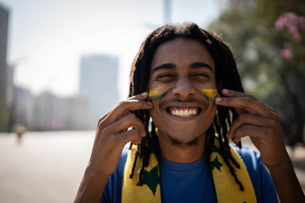 istock Portrait of a young man with painted face 1407167636