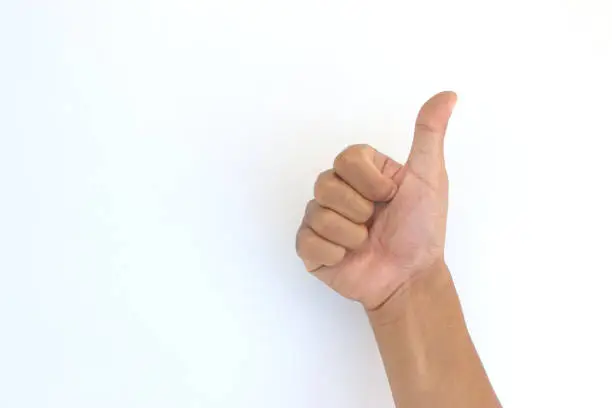 Photo of Thumbs up sign isolated on white background
