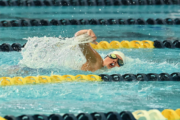 istock Young Boy Swimming at a Swim Meet 1407169102