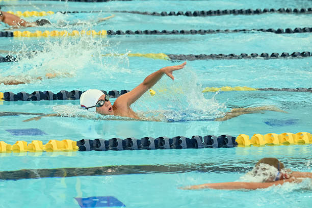 istock Young Boy Swimming at a Swim Meet 1407169114