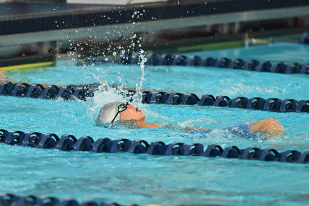 istock Young Boy Swimming at a Swim Meet 1407169143