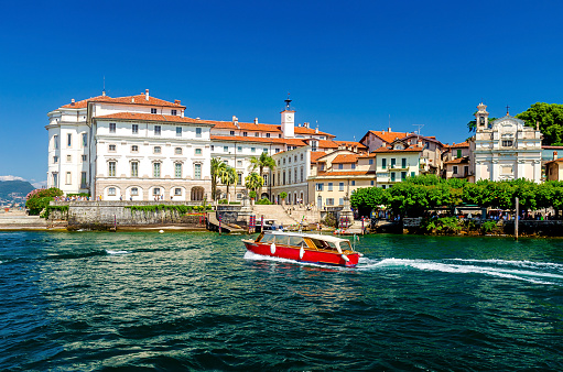 Beautiful port of Isola Bella island with baroque Borromean palace situated within Lake Maggiore (Lago Maggiore), near Stresa, Italy