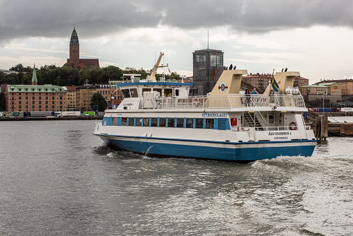 Gothenburg, Sweden - August 16 2021: Passenger ferry Älvsnabben 4 crossing the river.