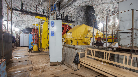Mine winder equipment in building. Elevator devices for iron ore mine.