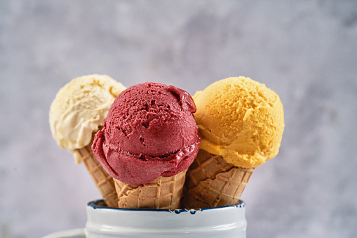 Vanilla, Berry and Mango Ice Cream in a Cone