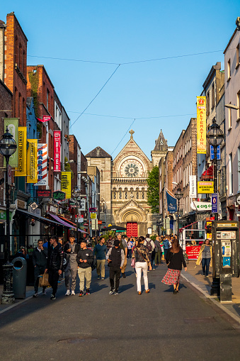Dublin, Ireland - June 3, 2022: Everyday busy life of tourists and townspeople in Dublin, Ireland.