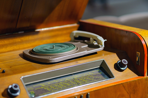 Vintage vinyl record player combined with radio receiver