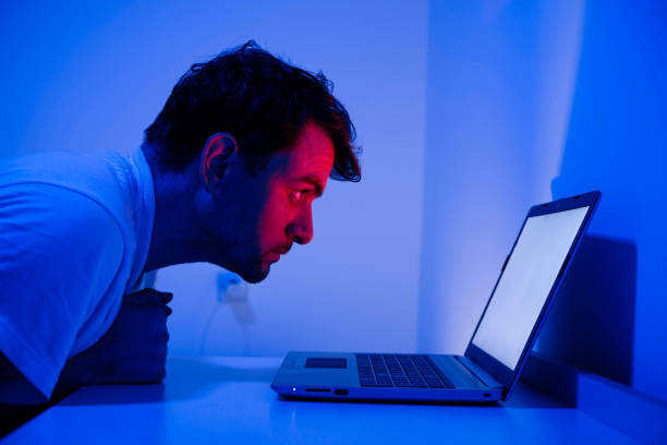 istock A young man in front of his laptop 1407177418