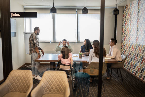 istock Coworkers on a meeting room at work 1407182724