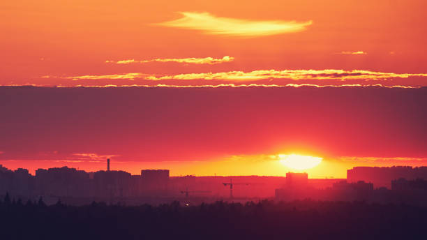 istock Evening sky with setting sun through clouds at sunset, cloudy landscape 1407183772