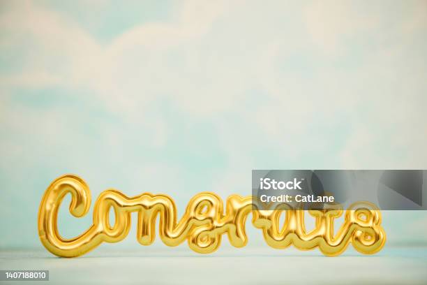 Congratulations Message In Gold Against Blue Sky With Lots Of Space For Copy Stock Photo - Download Image Now