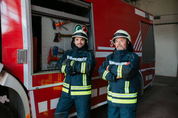 istock Two firefighters in the fire station 1407189441