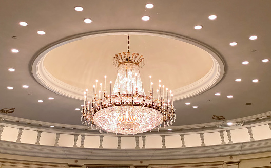 Beautiful crystal lamp in a ballroom