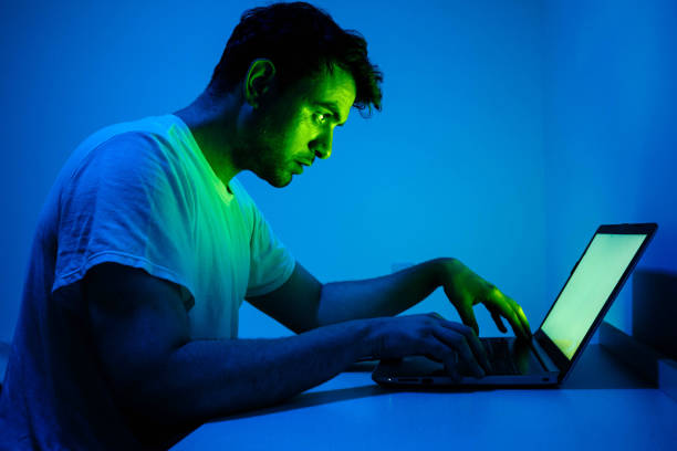 istock A young man is working in front of laptop 1407193011