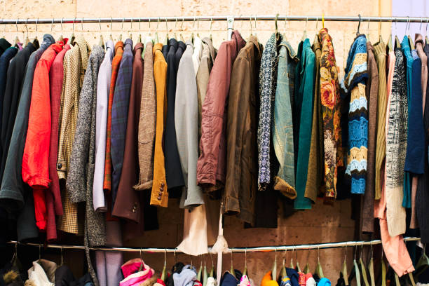istock Hanger with free clothes in humanitarian centre 1407194808