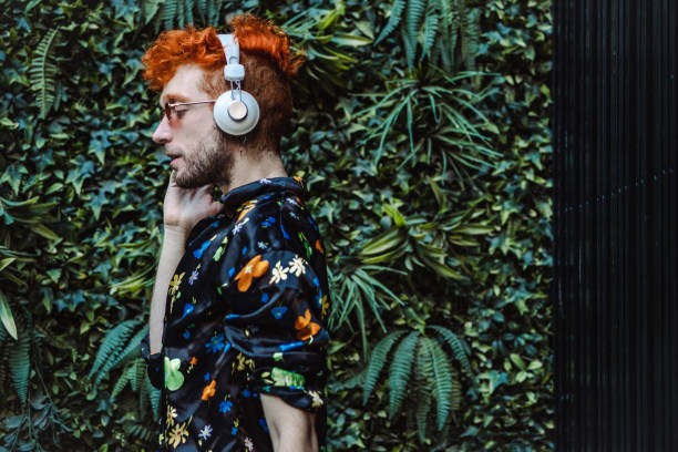 istock Gay man with headphones 1407194947
