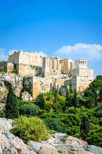 Happy woman tourist enjoying panoramic view of Acropolis- Athens in Greece