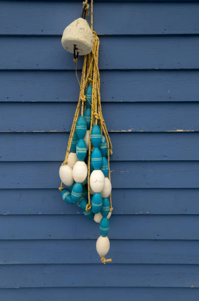 Petty Harbour net floats Net floats hanging on a wall at Petty Harbour buoy stock pictures, royalty-free photos & images