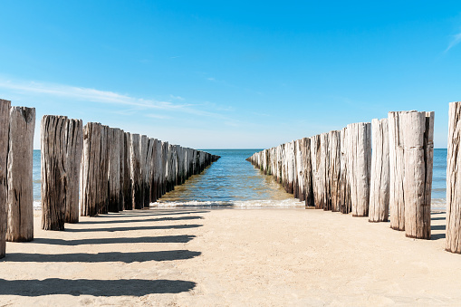 Breakwater on the beach, North sea, in The Netherlands. Domburg beach