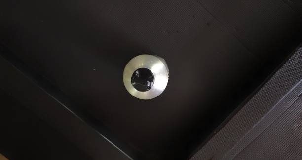 istock Stainless bottle tumbler between on the black  carpet 1407206596