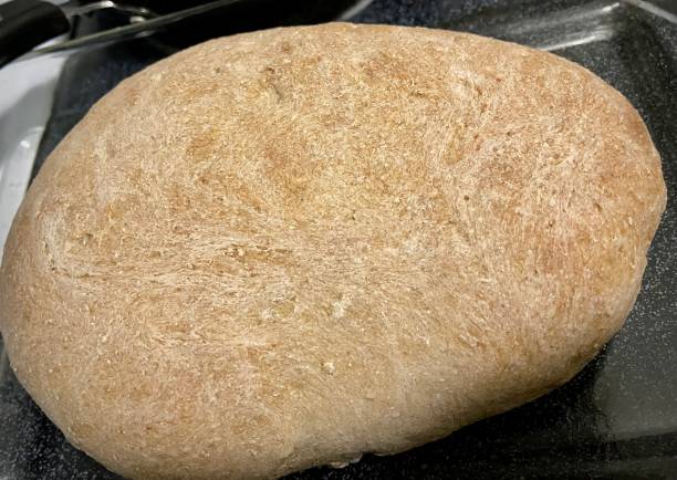 istock Fresh loaf of sourdough bread 1407207393