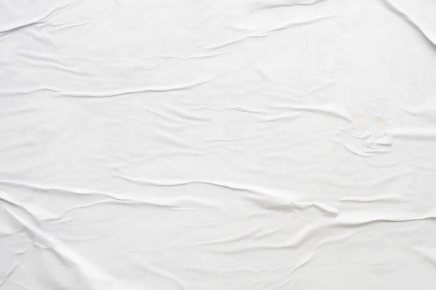 istock white crumpled and creased paper poster texture background 1407209128