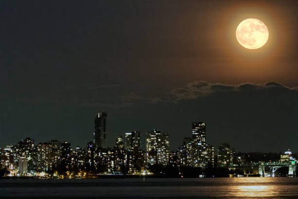 istock Waning 98.39% moon rising above Downtown Vancouver, BC, Canada 1407214657