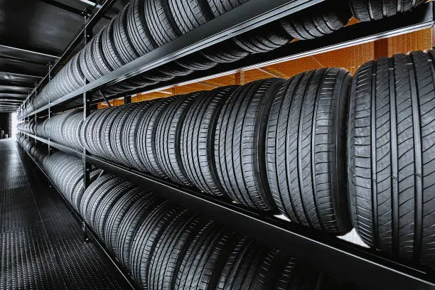 Photo of Panorama image of a new tire is placed on the tire storage rack in the tire industry. Be prepared for vehicles that need to change tires.