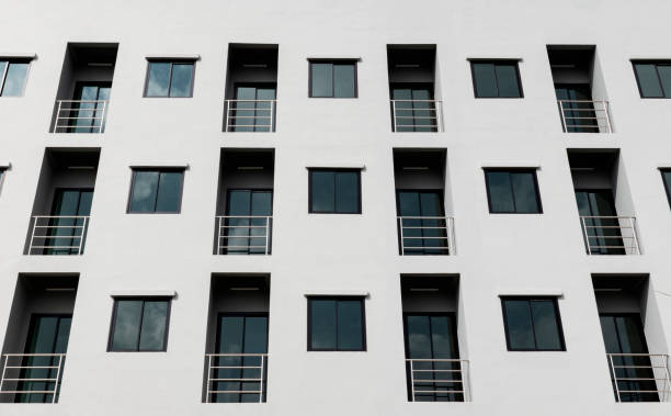 istock Rows of windows on modern apartment building 1407221118