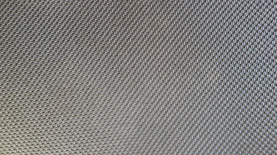 picture of the texture of jeans and a black combed 30s t-shirt  rubber and leather for wallpaper or background