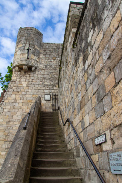 istock Exterior stone staircase attached to Bootham Bar in York, England 1407224741