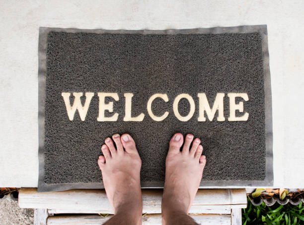 istock Overhead view of welcome mat outside 1407224774