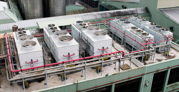 istock Cooling water tower on rooftop industry plant 1407224842