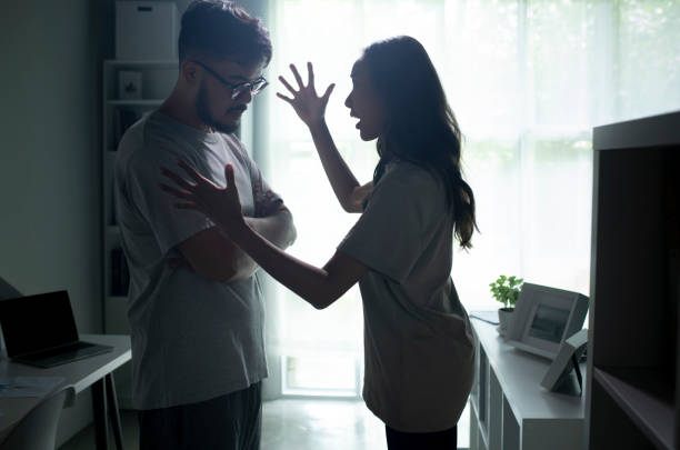 istock Asian couple arguing shouting blaming each other of problem. 1407231672