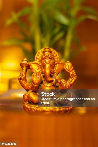 Selective Focus Of Lord Ganesha Statue Stock Photo - Download Image Now - Ganesh Chaturthi, Gold - Metal, Gold Colored