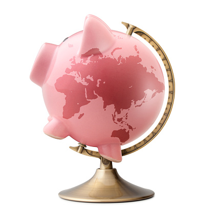 Piggy bank with drawn globe isolated on white background.