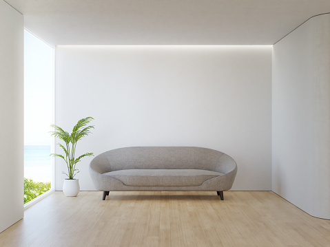 Empty wooden floor living room with white concrete wall background.