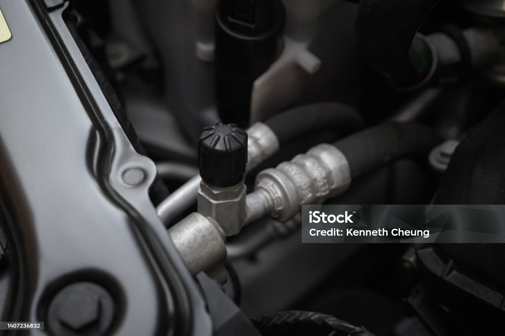 Car Air Conditioning (A/C) Service Port Closeup of an air conditioning service port on a car. Air Conditioner Stock Photo Car Air Conditioning (A/C) Service Port Closeup of an air conditioning service port on a car. Air Conditioner Stock Photo