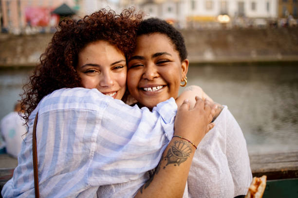 istock Diverse best friends embracing each other 1407236882