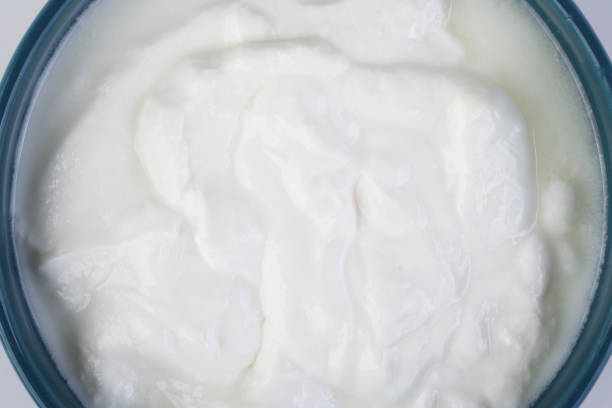 istock Beauty cream in open jar top view 1407241150